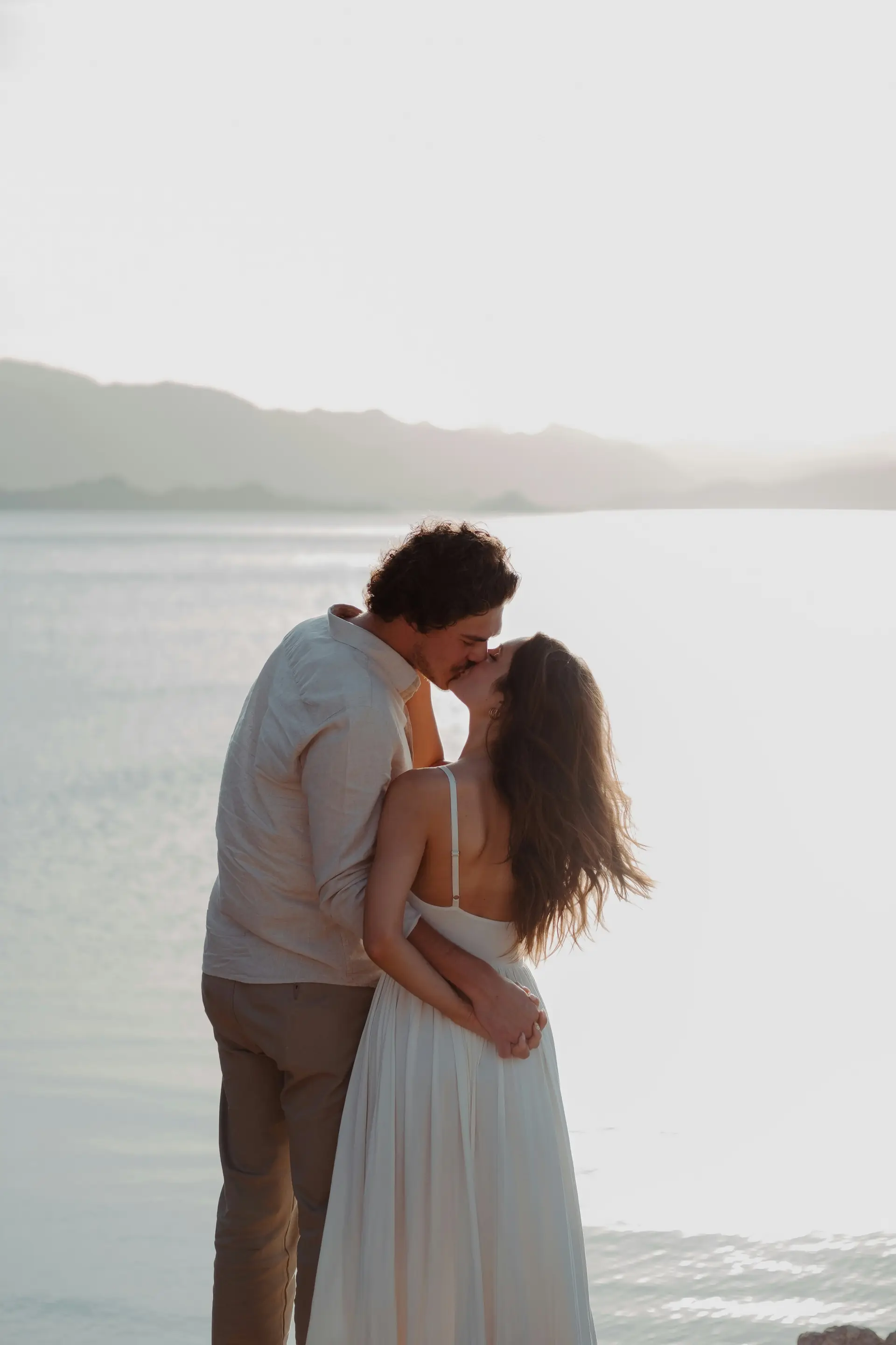Mira and Noel by the sea