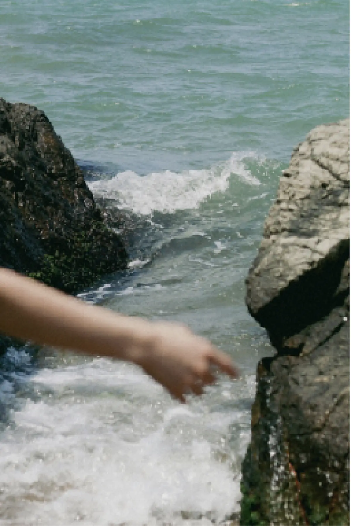 A hand above the water